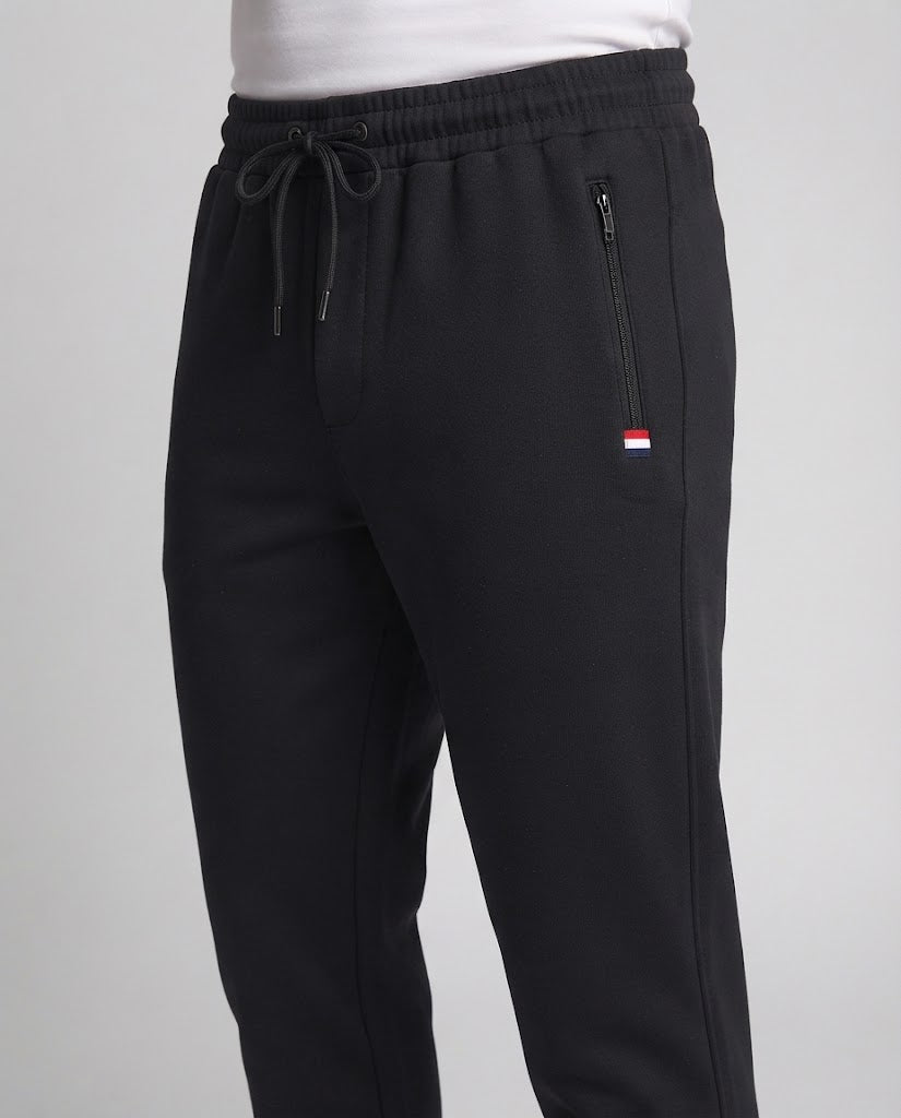 Herren Sportliche Joggerhose mit Reißverschlusstasche, elastischem Bund und geripptem Saum Drune