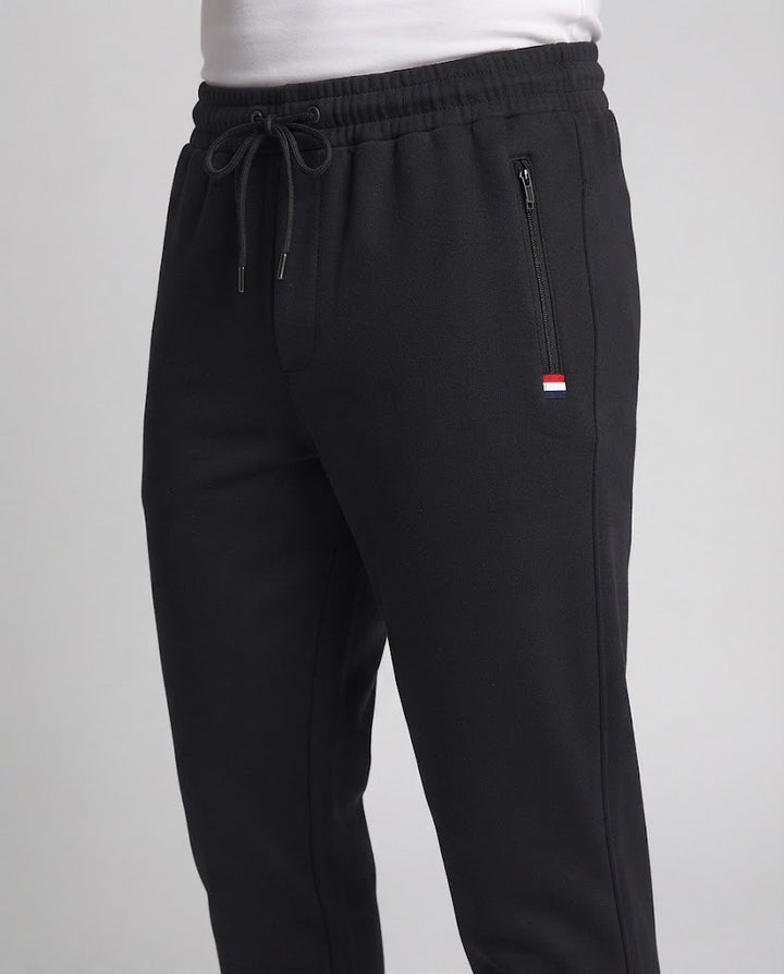 Herren Sportliche Joggerhose mit Reißverschlusstasche, elastischem Bund und geripptem Saum Drune