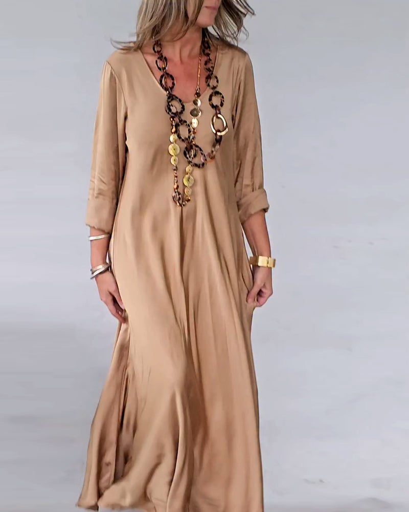 Drune | Kleid mit V-Ausschnitt und Swing Saum