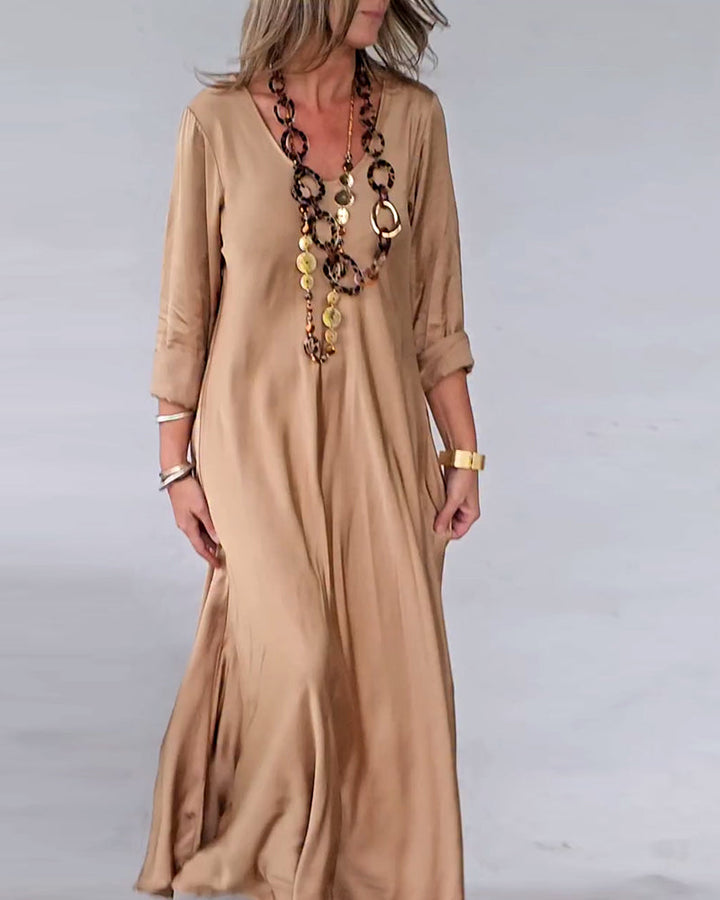 Drune | Kleid mit V-Ausschnitt und Swing Saum