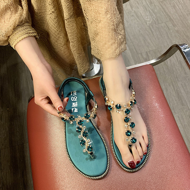 Damen nan flache T-Riemen-Sandalette mit funkelnder Schmuckkette, elastischem Fersenband und gepolstertem Fußbett Drune