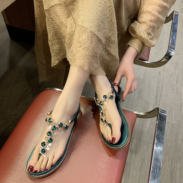 Damen nan flache T-Riemen-Sandalette mit funkelnder Schmuckkette, elastischem Fersenband und gepolstertem Fußbett Drune