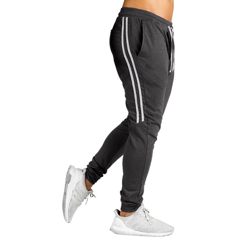 Herren Sportliche Jogginghose mit atmungsaktiver Struktur und seitlichen Streifen Drune