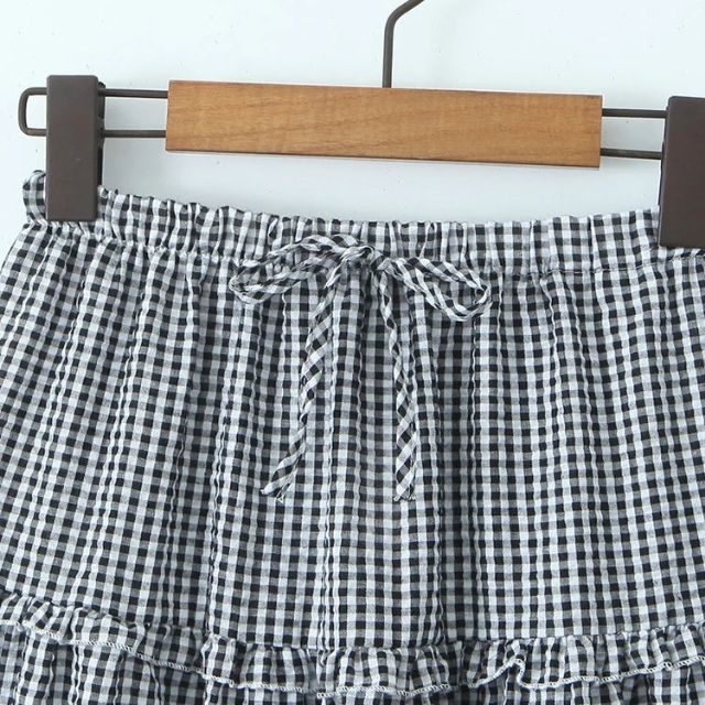 Drune | Gestuftes Gingham-Midirock mit Rüschendetail