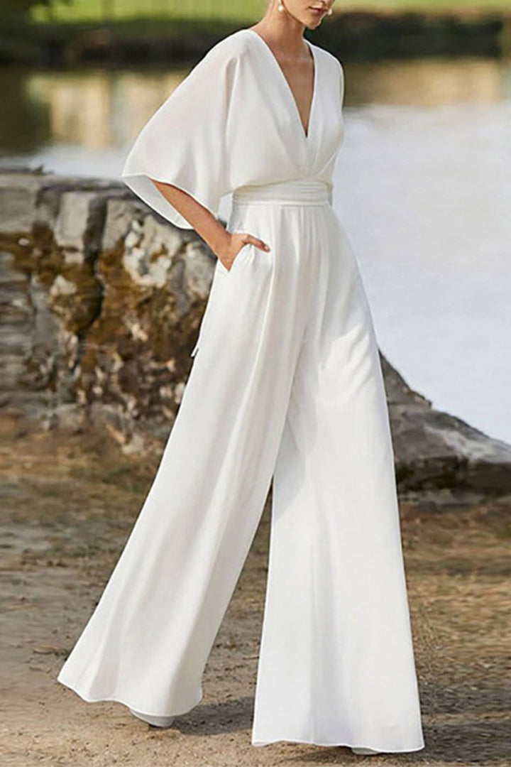 Drune | Elegante Einfarbige V-Ausschnitt Boot Cut Jumpsuits