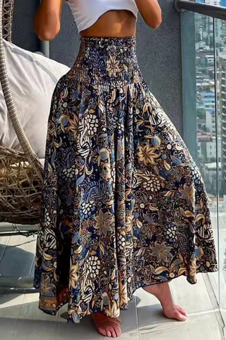 Drune | Elegante, lockere Hose mit hohem Bund und ganzflächigem A-Typ Blumenmuster