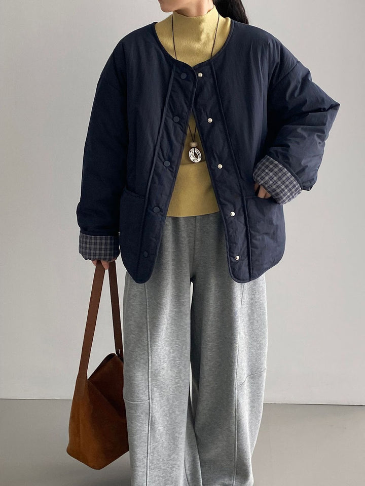 Lockere Damen-Steppjacke im Karomuster