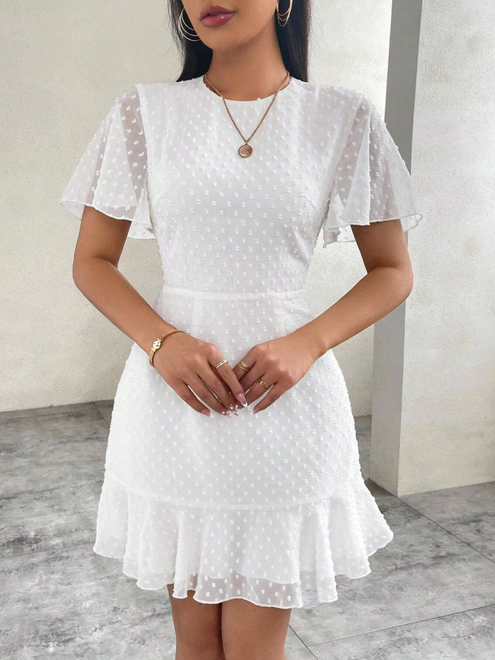 Drune | Dreidimensionales Kleid mit Rüschenrand und Punkten