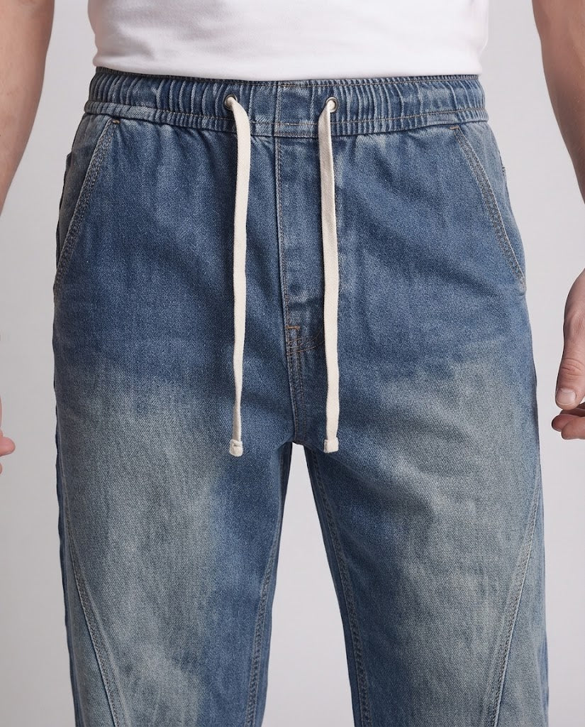 Herren Weite Denim-Palazzohose mit geschwungenen Seitennähten und Used-Wash Drune