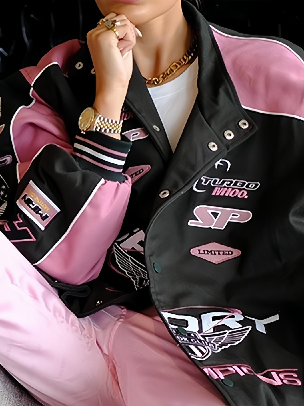 Drune | Schwarze Pink Raglan-Motojacke mit bedrucktem Slogan