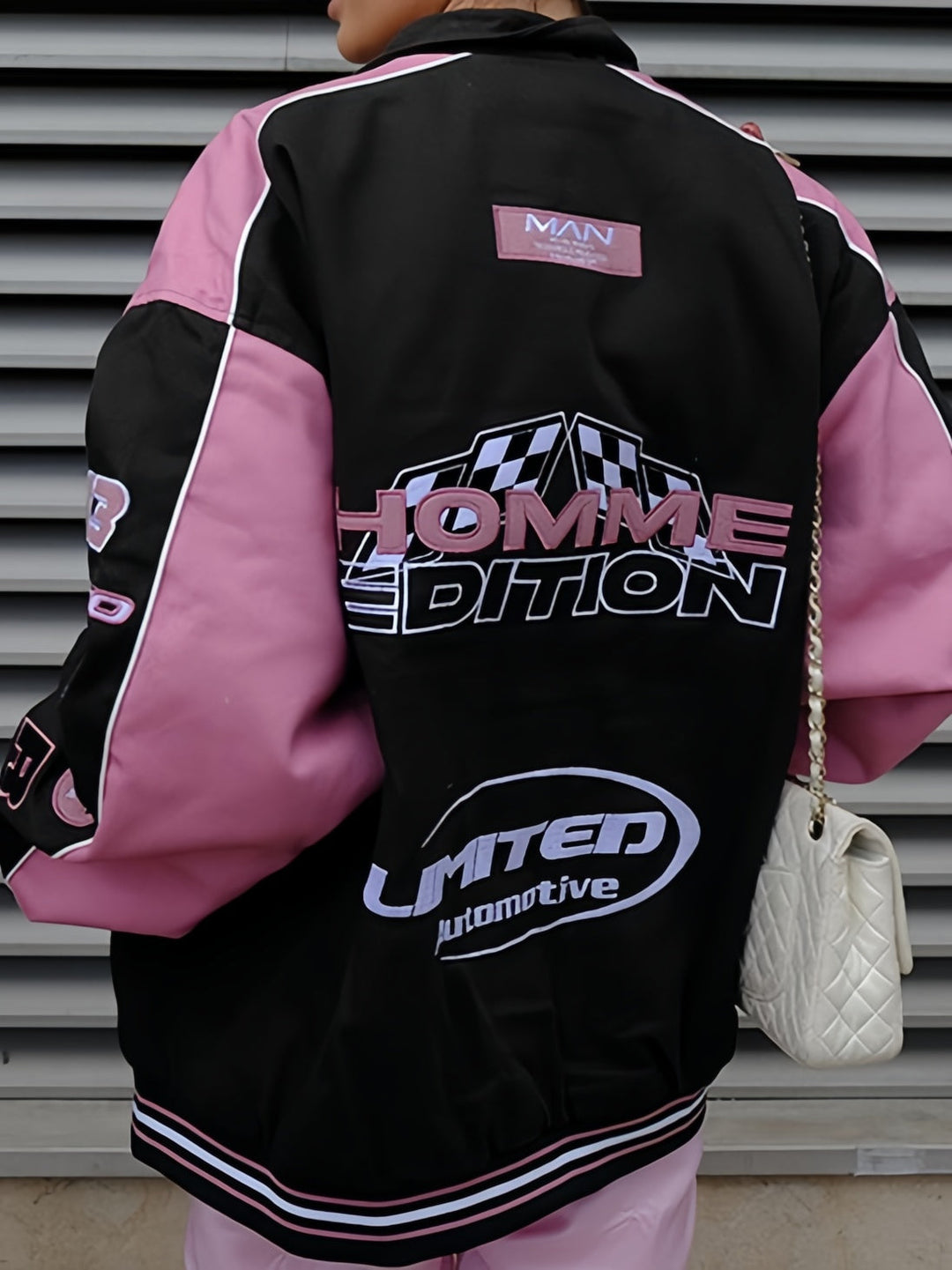 Drune | Schwarze Pink Raglan-Motojacke mit bedrucktem Slogan