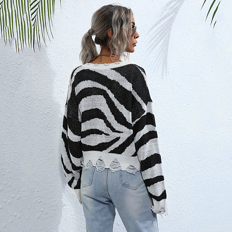 Damen Oversize V-Ausschnitt Strickpullover mit Zebramuster und ausgefranstem Saum Drune