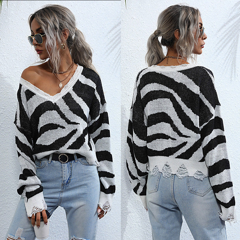 Damen Oversize V-Ausschnitt Strickpullover mit Zebramuster und ausgefranstem Saum Drune