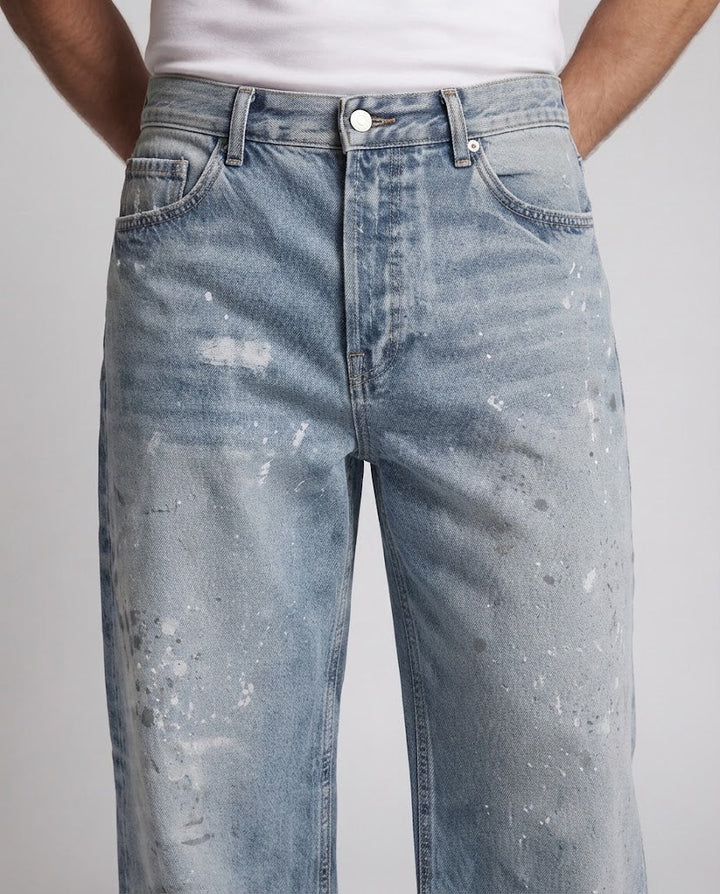 Herren weit geschnittene Vintage-Denim Jeans mit Used-Effekten und Paint-Splatter Drune