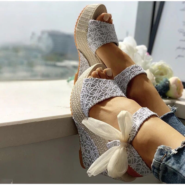 Damen nan romantische Spitzen-Keilabsatzsandalen mit Bast-Plateau und Zierschleife Drune
