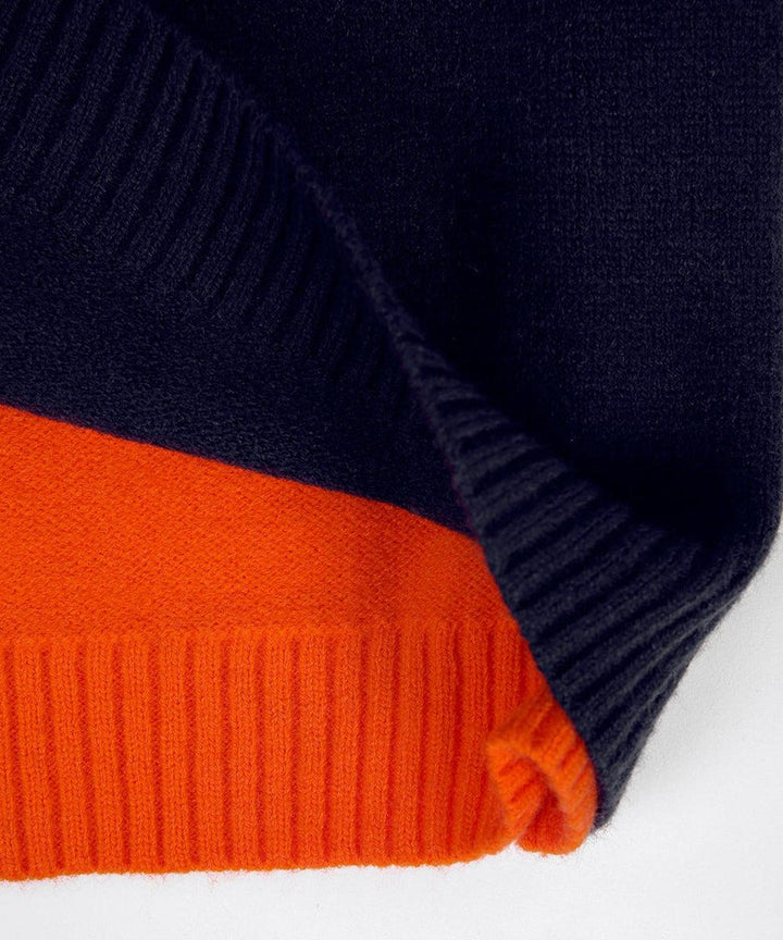 Drune | Damenpullover mit Retro-Streifen in Marine und Orange