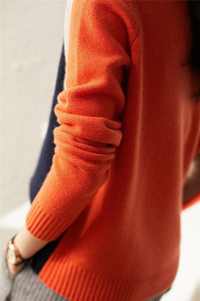 Drune | Damenpullover mit Retro-Streifen in Marine und Orange