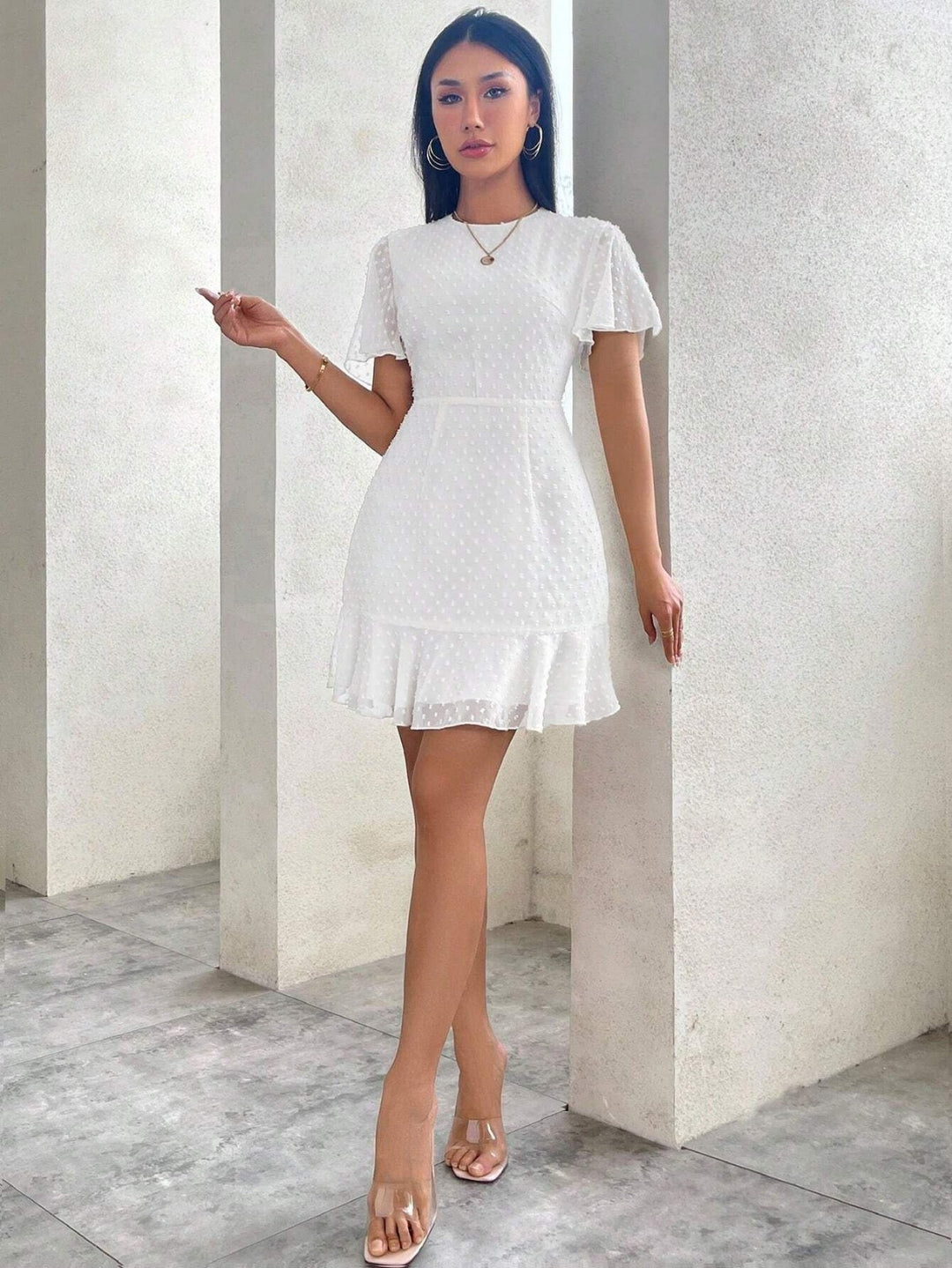 Drune | Dreidimensionales Kleid mit Rüschenrand und Punkten