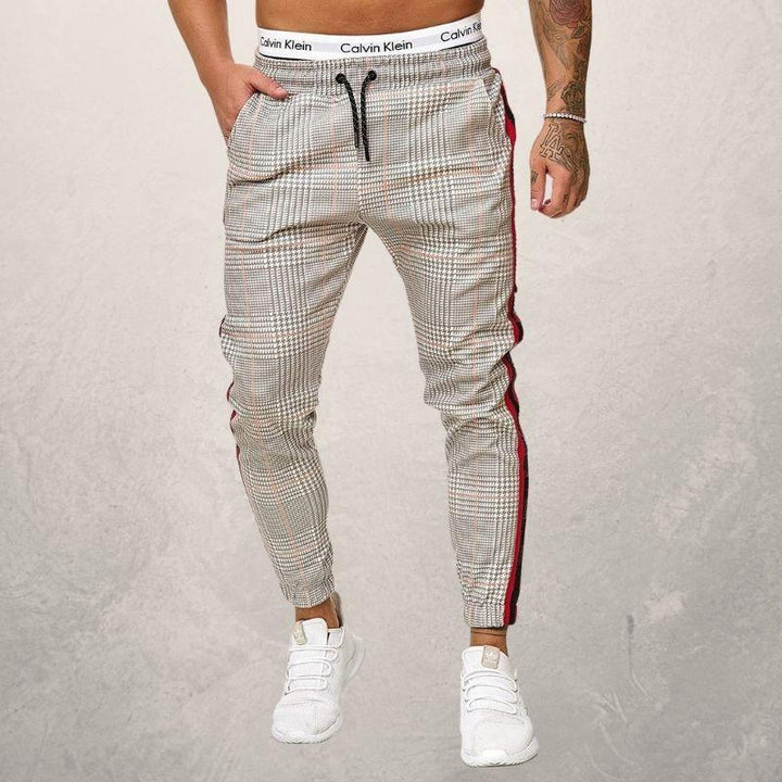 Drune | Jogginghose Slim Fit Elastischer Bund Mit Kordelzug Strukturiertes Material Seitenstreifen