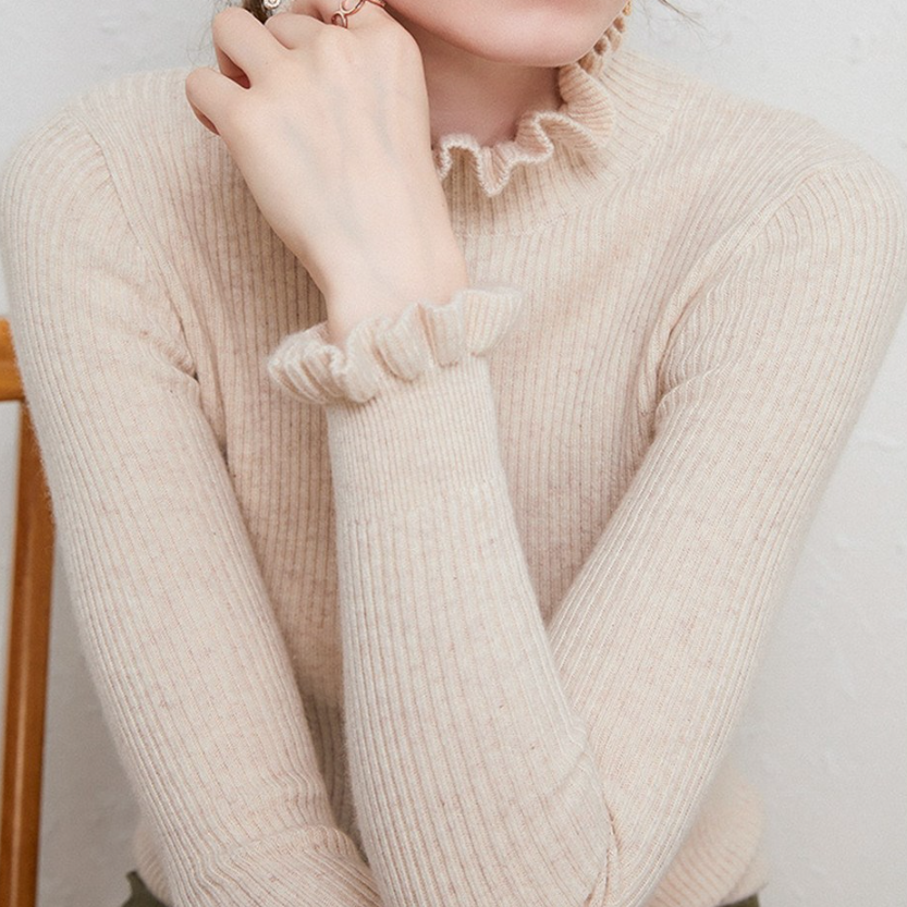 Drune | Rollkragenpullover mit femininen Rüschendetails
