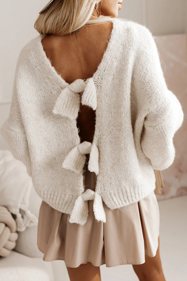 Drune | Cozy knit sweater with an open back and bow.