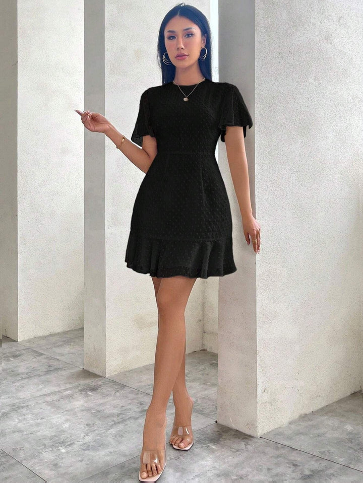 Drune | Dreidimensionales Kleid mit Rüschenrand und Punkten