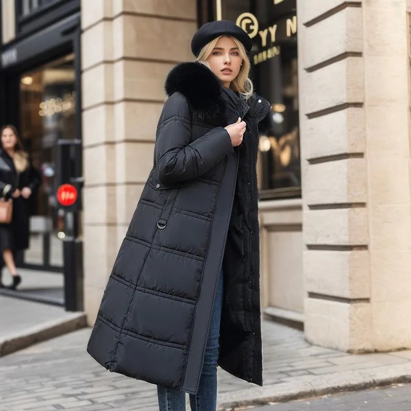 Drune | Damen lange Winterjacke mit Pelzmütze und Gürtel