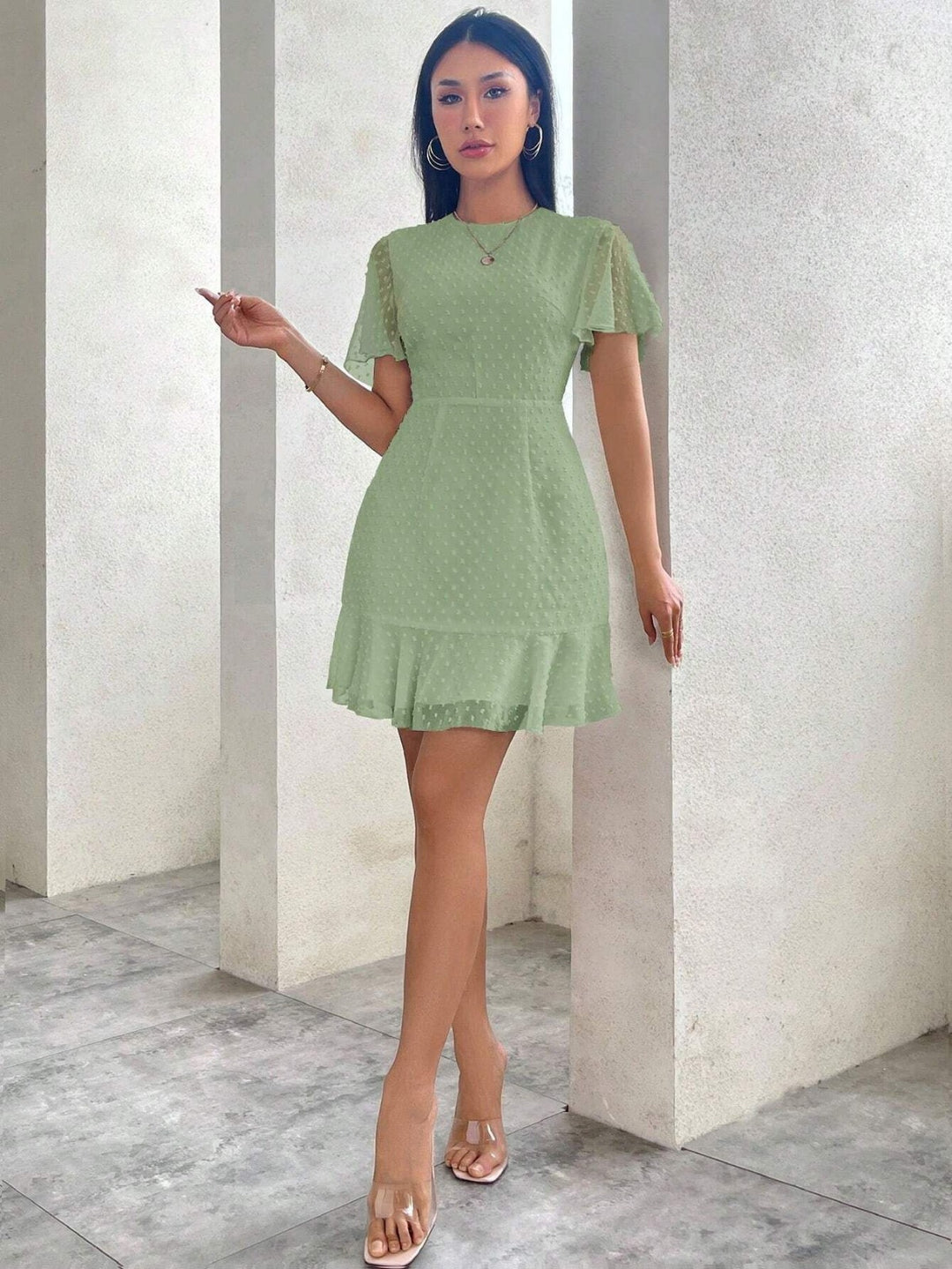 Drune | Dreidimensionales Kleid mit Rüschenrand und Punkten