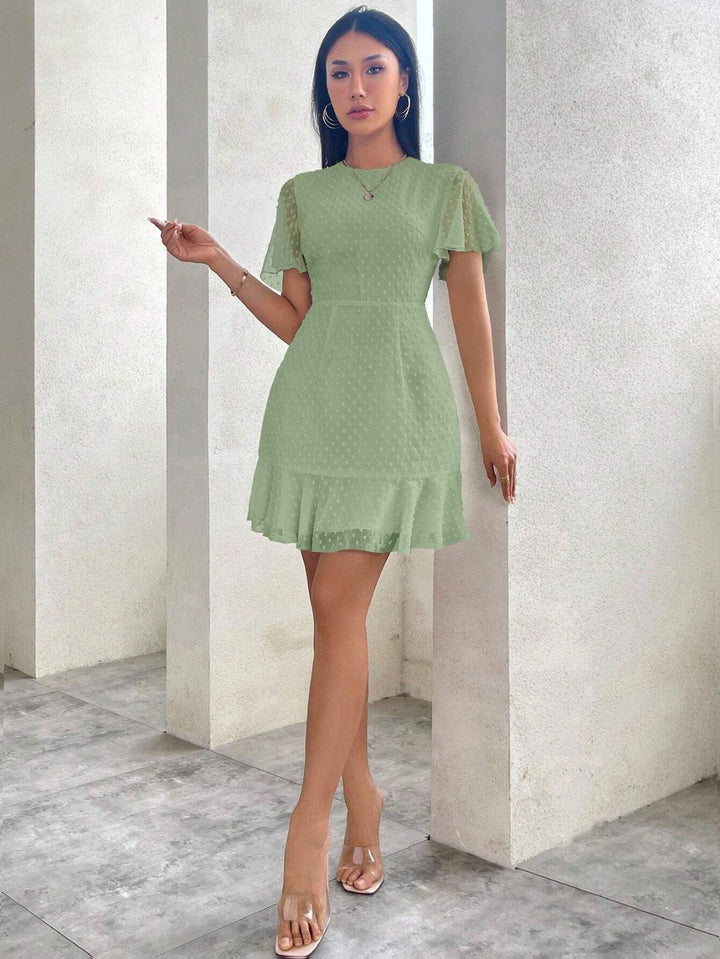 Drune | Dreidimensionales Kleid mit Rüschenrand und Punkten