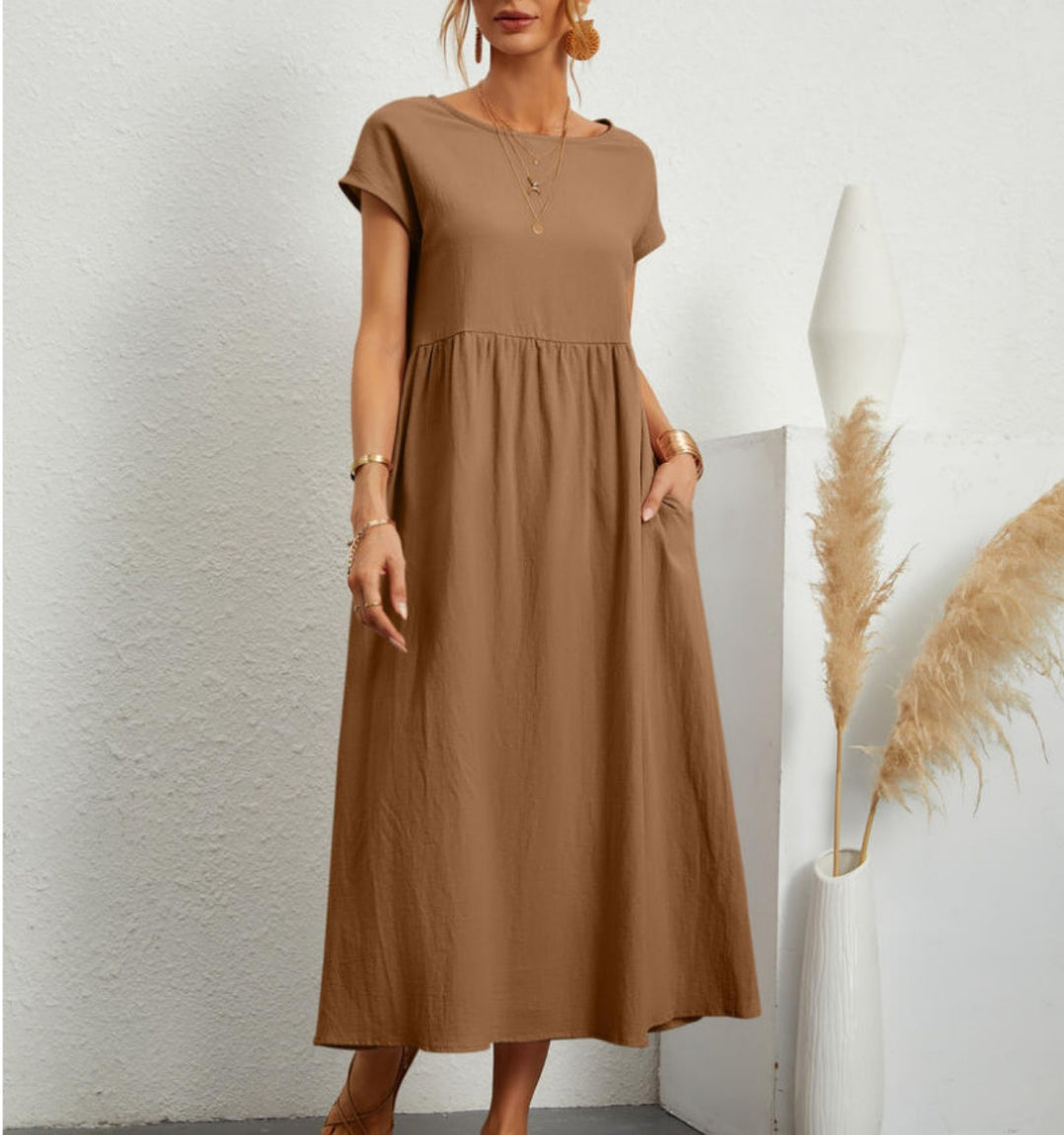 Drune | Einfarbiges ärmelloses lockeres Taschenkleid