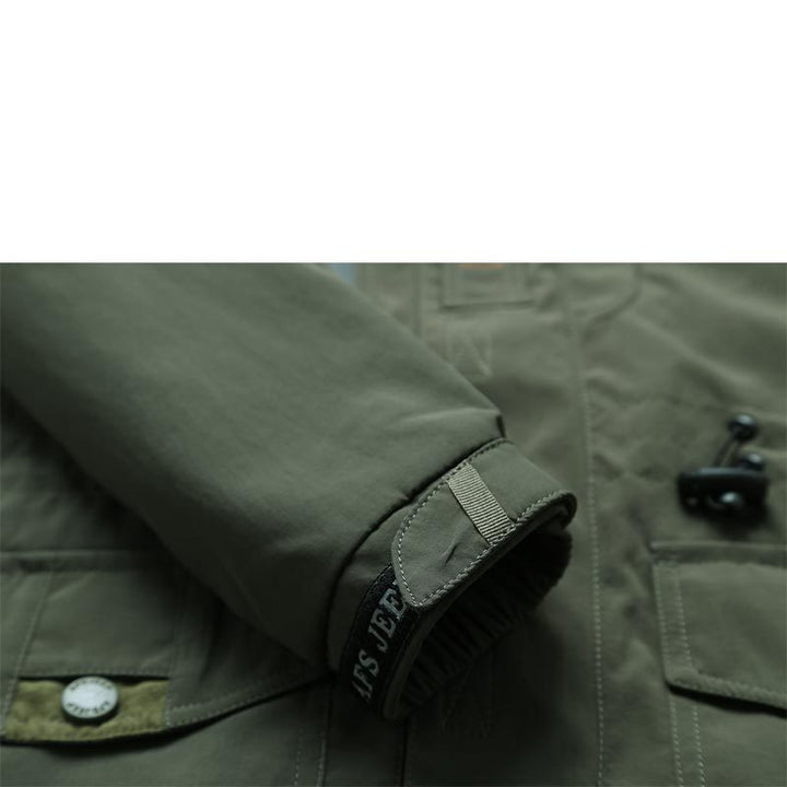 Herren Fieldjacke mit Mesh-Innenfutter, Kapuze und Multifunktions‑Taschen Drune
