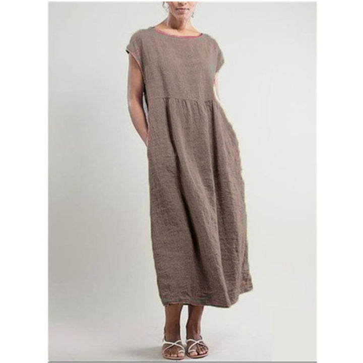 Drune | Einfarbiges ärmelloses lockeres Taschenkleid