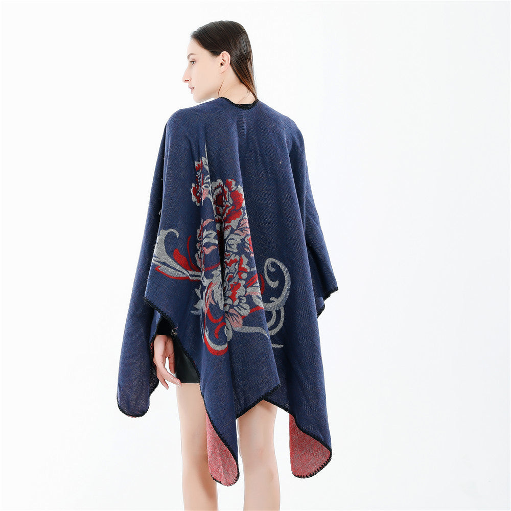 Damen Reversibler Capeponcho aus Wollmix mit floralem Jacquardfutter Drune