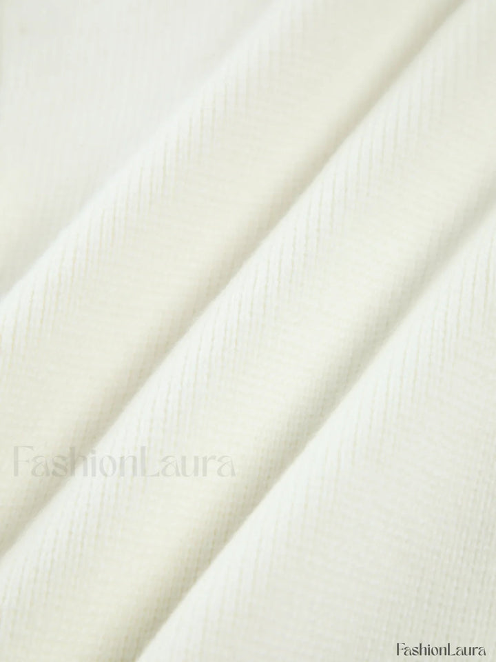 Drune | Knit cardigan with pearl embellishments and frayed hem