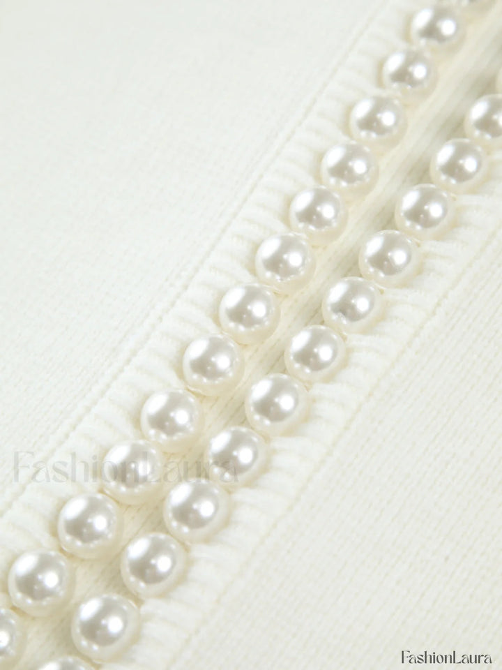 Drune | Knit cardigan with pearl embellishments and frayed hem