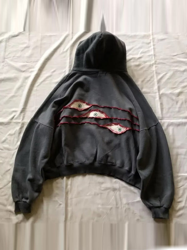 Drune | schwarze Augenprint Oversized-Hoodie