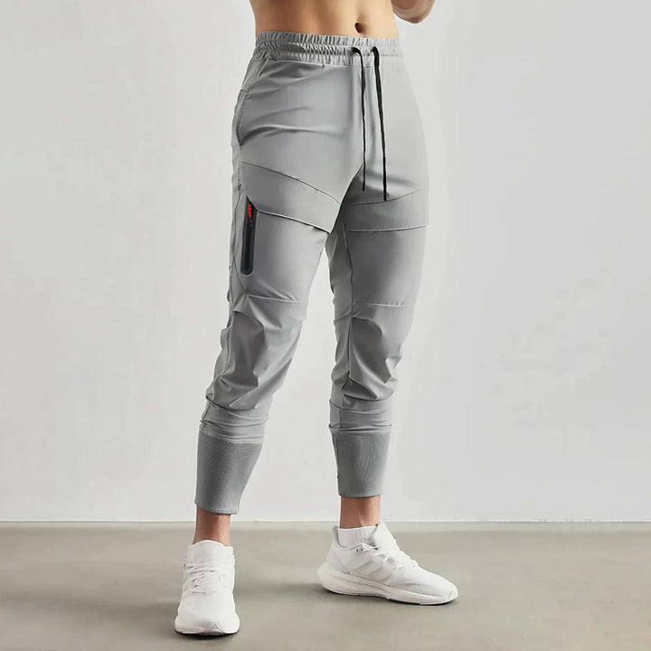 Drune | Jogginghose mit Cargo-Taschen - Sportliche Trainingshose Slim Fit für Alltag & Fitness