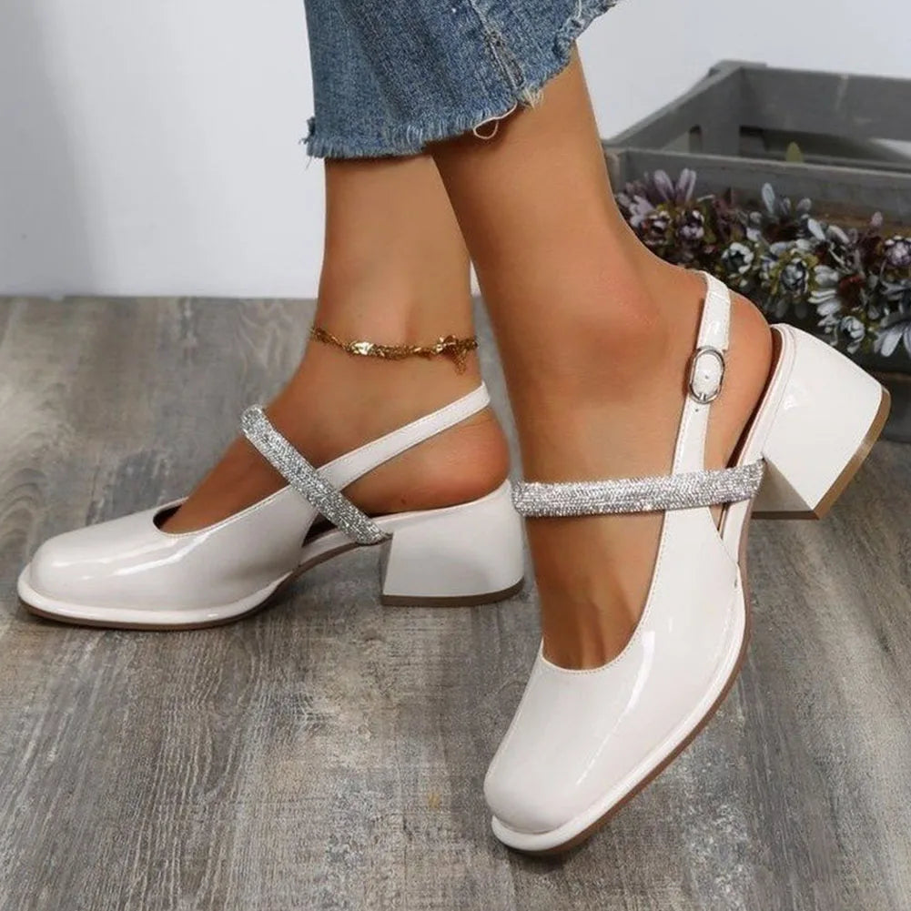 Glitzernde WeißlackPumps Drune