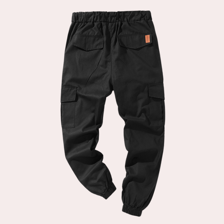 Drune | Cargo Jogginghose mit Taschen & Kordelzug - Slim Fit Streetwear Hose für Freizeit & Training