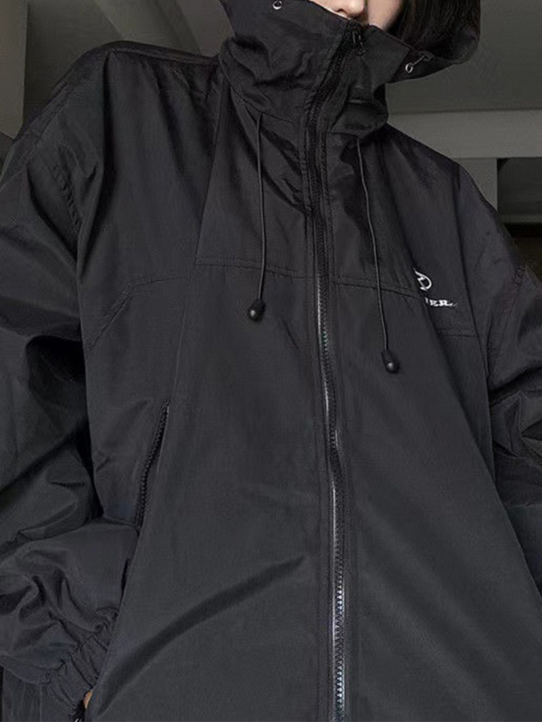 Drune | retro schwarze wasserdichte Outdoorjacke mit Kapuze
