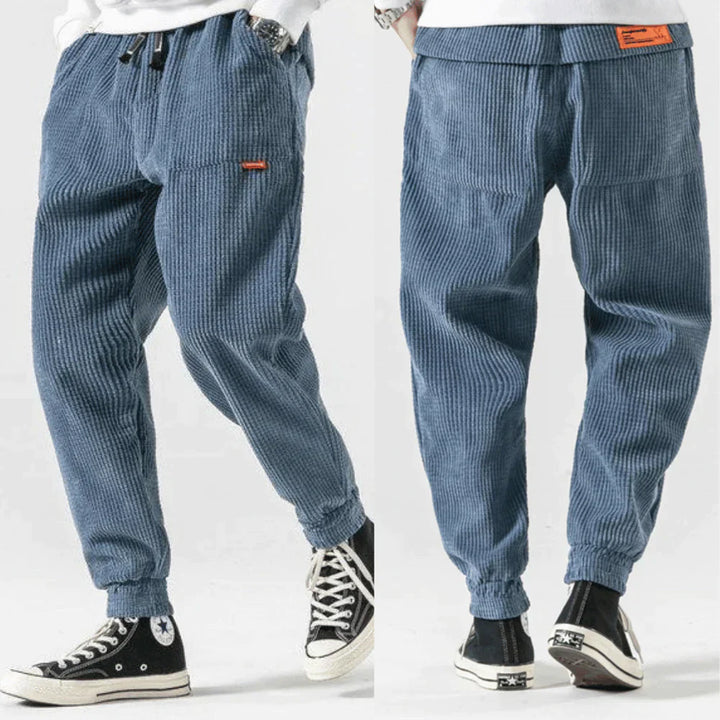 Drune | Cord Jogginghose mit Kordelzug - Locker geschnittene Freizeithose im Streetwear Style mit Bündchen & Seitentaschen