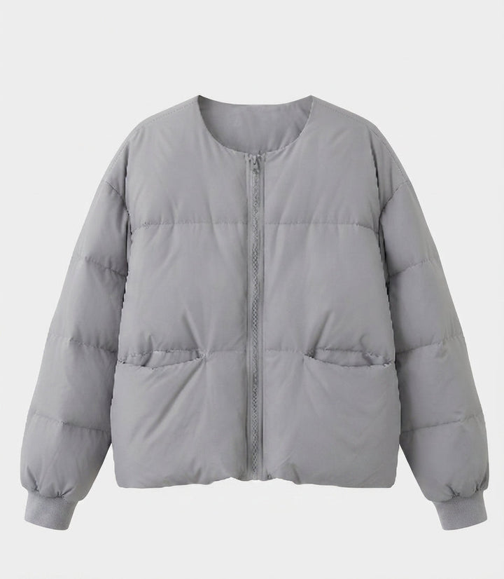 Damen kurze boxy gesteppte Jacke mit geradem Schnitt, verdecktem Reißverschluss und elastischen Bündchen
