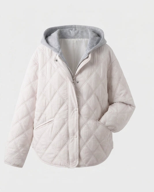 Damen kurze gesteppte Blousonjacke mit feiner Rautensteppung, Kapuzenfutter und wärmender thermischer Polsterung.