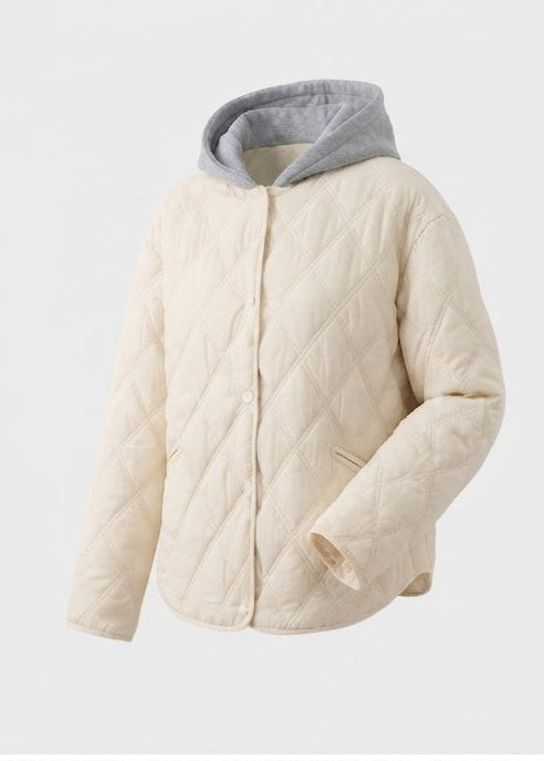 Damen kurze gesteppte Blousonjacke mit feiner Rautensteppung, Kapuzenfutter und wärmender thermischer Polsterung.