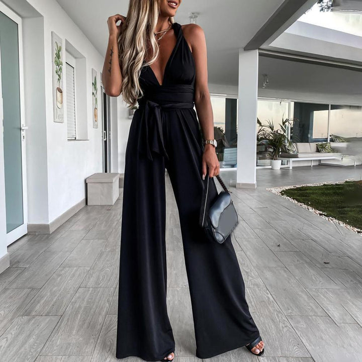 Drune | Eleganter ärmelloser Jumpsuit mit tiefem V-Ausschnitt, Taillenbund und weitem Bein