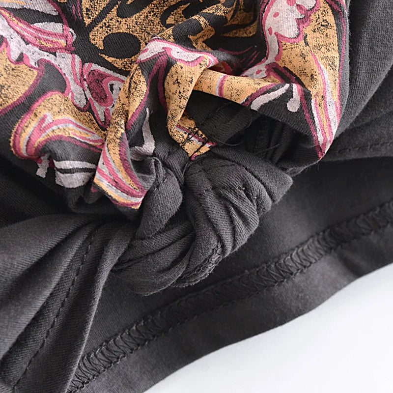 Drune | Crop-T-Shirt mit Knopfdetail