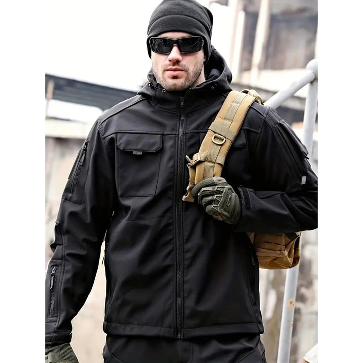 Drune | Wasserabweisende Softshell-Jacke mit Kapuze