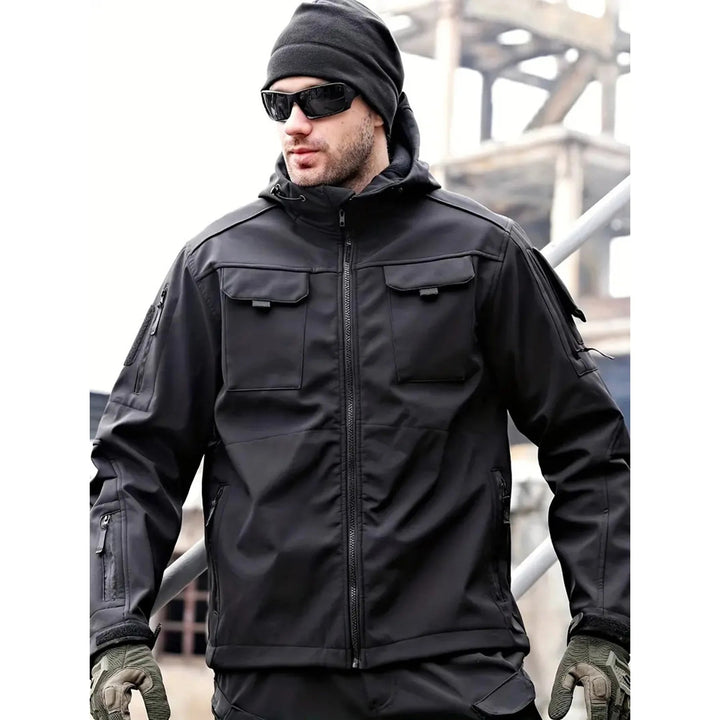 Drune | Wasserabweisende Softshell-Jacke mit Kapuze