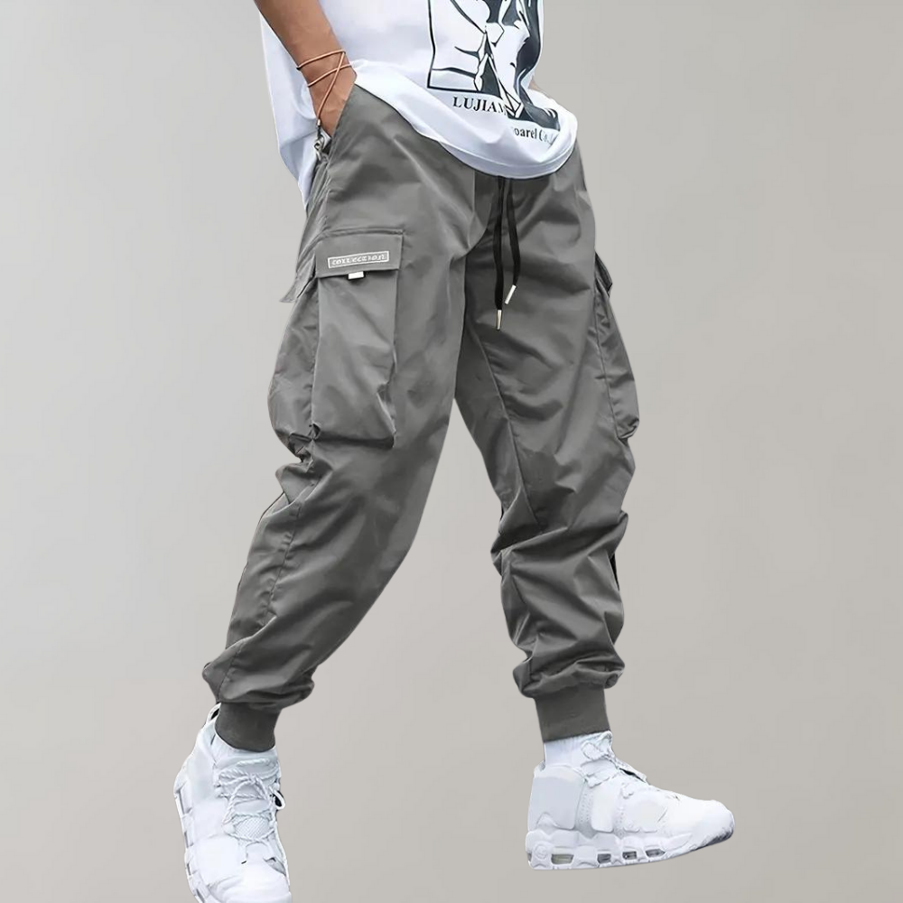 Drune | Lose Sitzende Cargohose mit Verstellbarem Kordelzug und Mehreren Taschen
