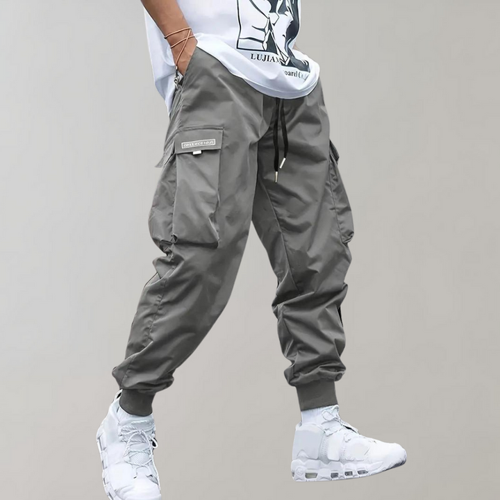 Drune | Lose Sitzende Cargohose mit Verstellbarem Kordelzug und Mehreren Taschen